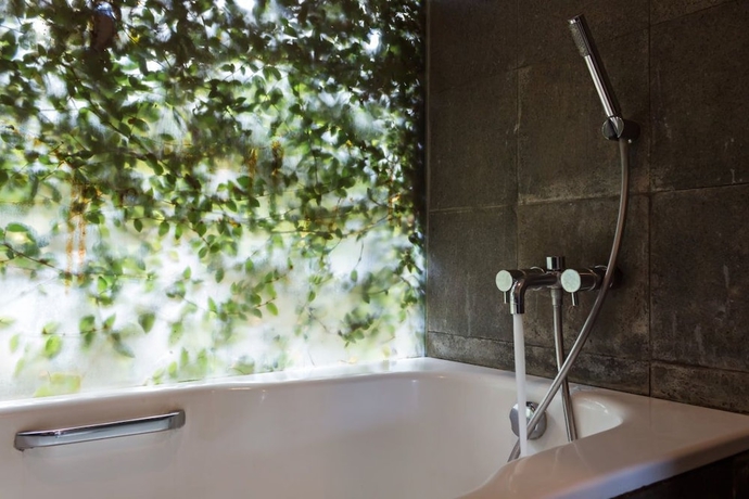 Imagen de la habitación del Hotel Tea Garden Resort. Foto 16