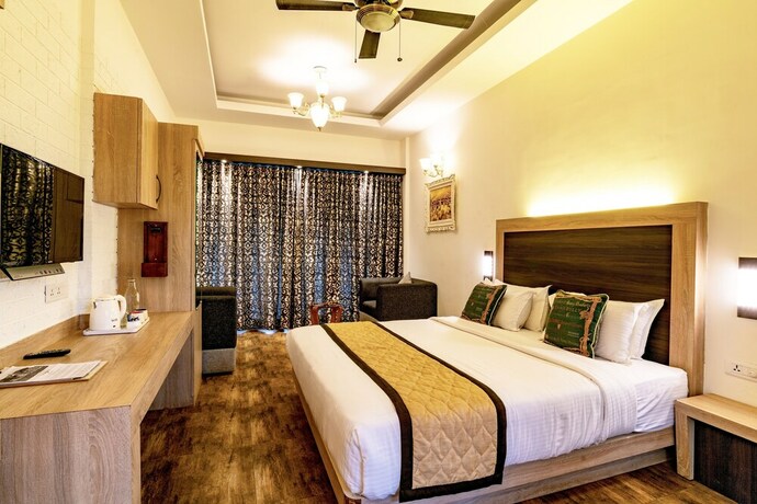 Imagen de la habitación del Hotel Tea Harvester Munnar. Foto 19