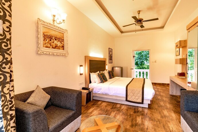 Imagen de la habitación del Hotel Tea Harvester Munnar. Foto 21