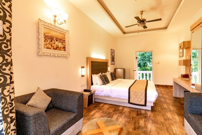 Imagen de la habitación del Hotel Tea Harvester Munnar. Foto 24