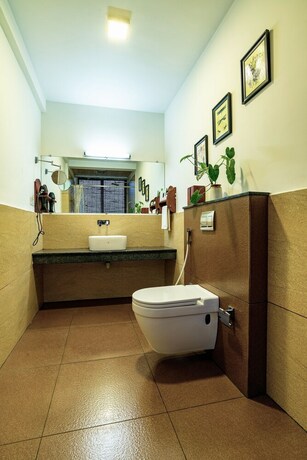 Imagen de la habitación del Hotel Tea Harvester Munnar. Foto 27