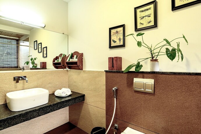 Imagen de la habitación del Hotel Tea Harvester Munnar. Foto 28