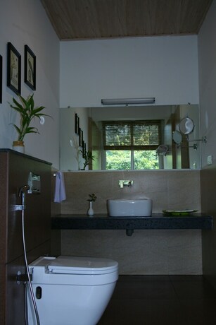 Imagen de la habitación del Hotel Tea Harvester Munnar. Foto 29