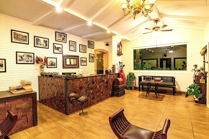 Imagen de los interiores del Hotel Tea Harvester Munnar. Foto 30
