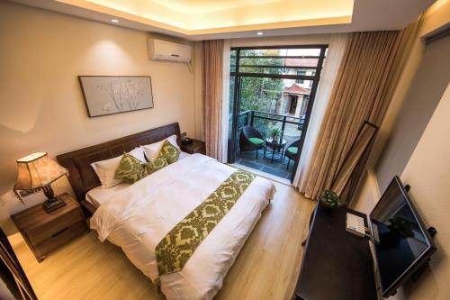 Imagen de la habitación del Hotel Tea Talk Villa. Foto 5