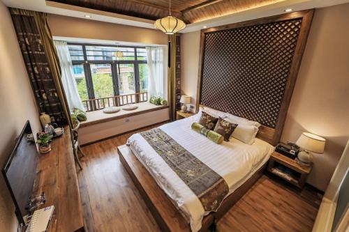 Imagen de la habitación del Hotel Tea Talk Villa. Foto 6