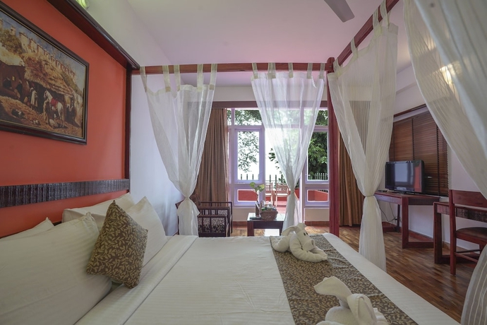 Imagen de la habitación del Hotel Tea Valley Resort. Foto 4