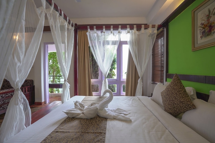 Imagen de la habitación del Hotel Tea Valley Resort. Foto 11