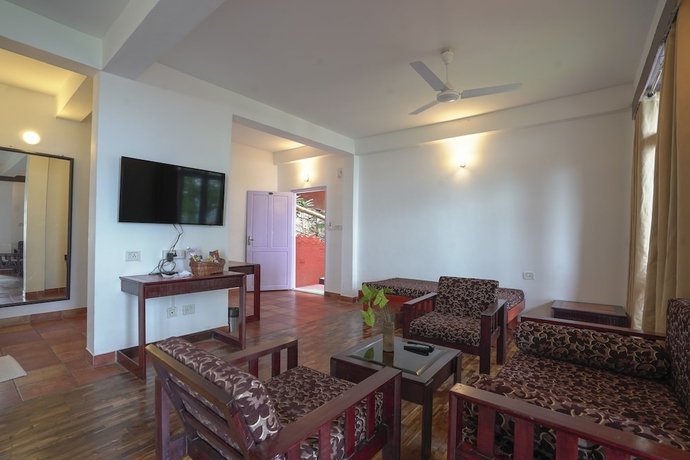 Imagen de la habitación del Hotel Tea Valley Resort. Foto 14