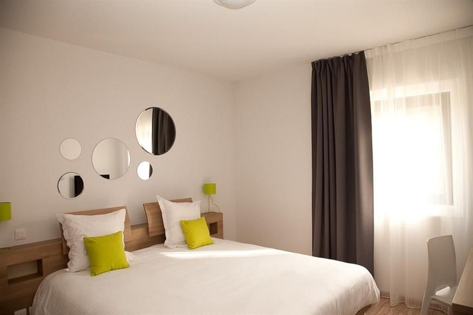 Imagen de la habitación del Hotel Ténéo Apparthotel Mérignac. Foto 7