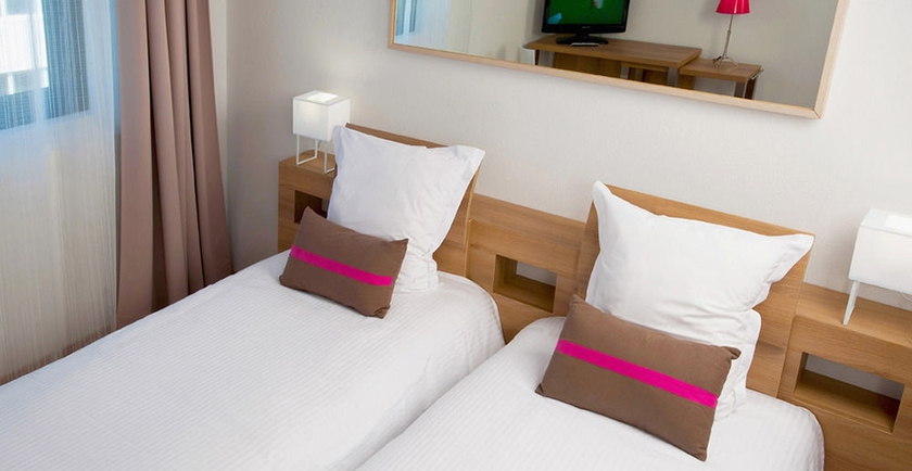 Imagen de la habitación del Hotel Ténéo Apparthotel Mérignac. Foto 9