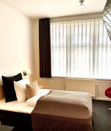 Imagen de la habitación del Hotel Teaterhotellet, HORSENS. Foto 12