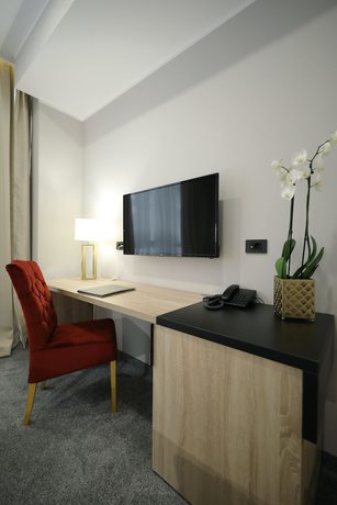 Imagen de la habitación del Hotel Teatro Verdi Hotel. Foto 5