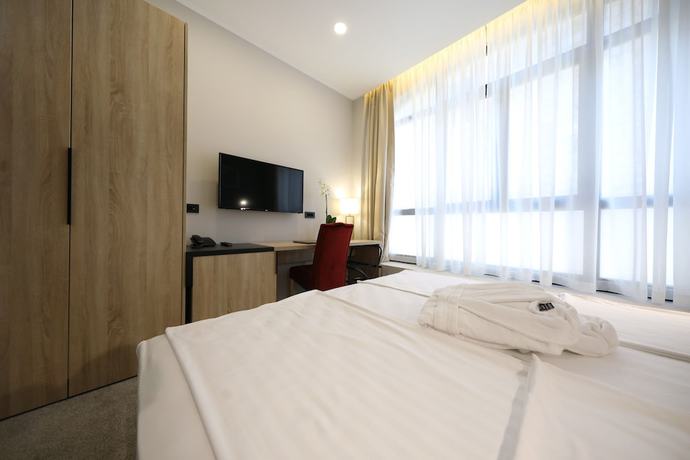 Imagen de la habitación del Hotel Teatro Verdi Hotel. Foto 7