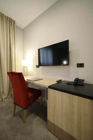 Imagen de la habitación del Hotel Teatro Verdi Hotel. Foto 14