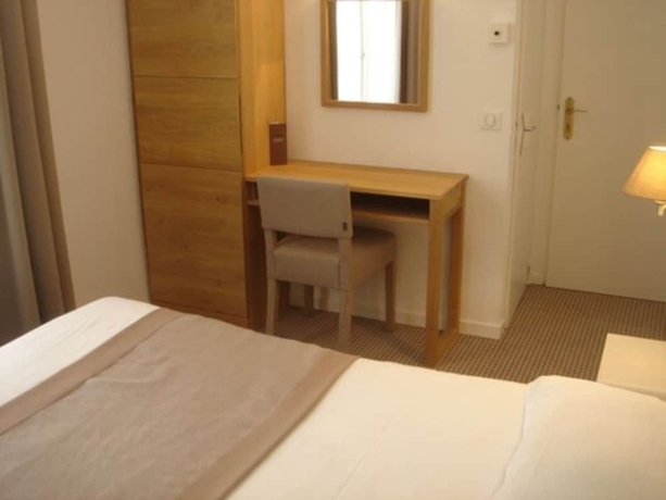 Imagen de la habitación del Hotel Tête D'or. Foto 6