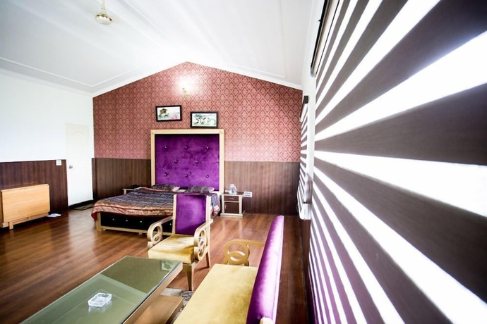 Imagen de la habitación del Hotel Tehri Club and Resorts. Foto 9