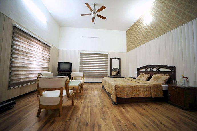 Imagen de la habitación del Hotel Tehri Club and Resorts. Foto 10