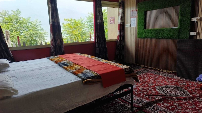 Imagen de la habitación del Hotel Tehri lake View Camping and Cottage. Foto 9