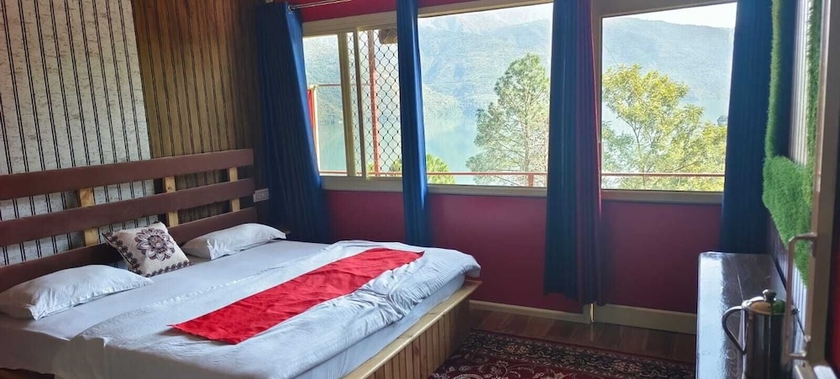 Imagen de la habitación del Hotel Tehri lake View Camping and Cottage. Foto 11