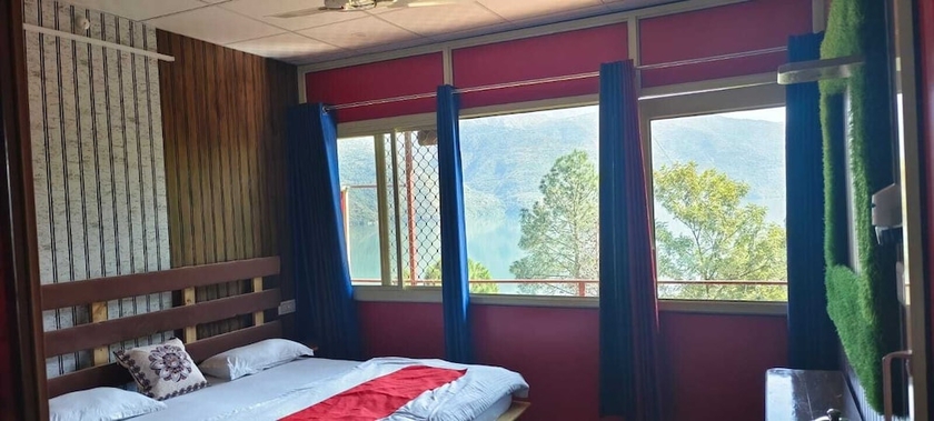 Imagen de la habitación del Hotel Tehri lake View Camping and Cottage. Foto 13