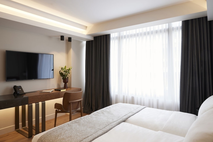 Imagen de la habitación del Hotel Teight. Foto 16