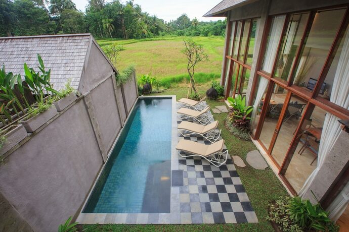 Imagen de la habitación del Hotel Tejaprana Bisma. Foto 11