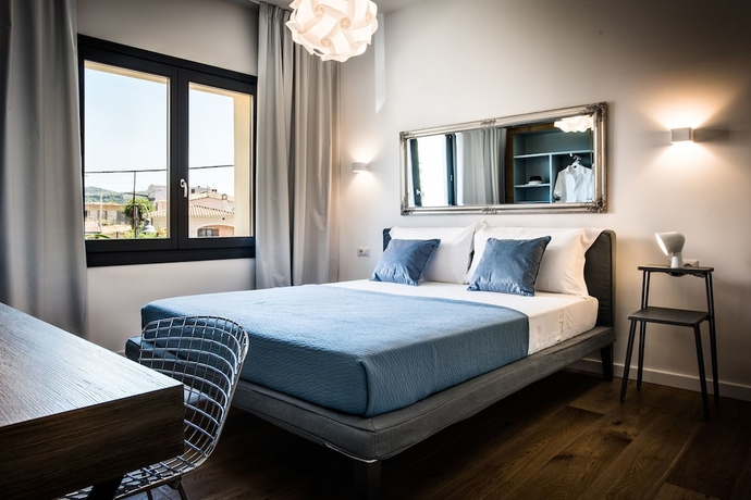 Imagen de la habitación del Hotel Teku Sardinia Boutique. Foto 19