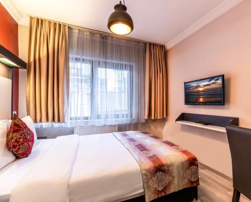 Imagen general del Hotel Tel Street Suites. Foto 14