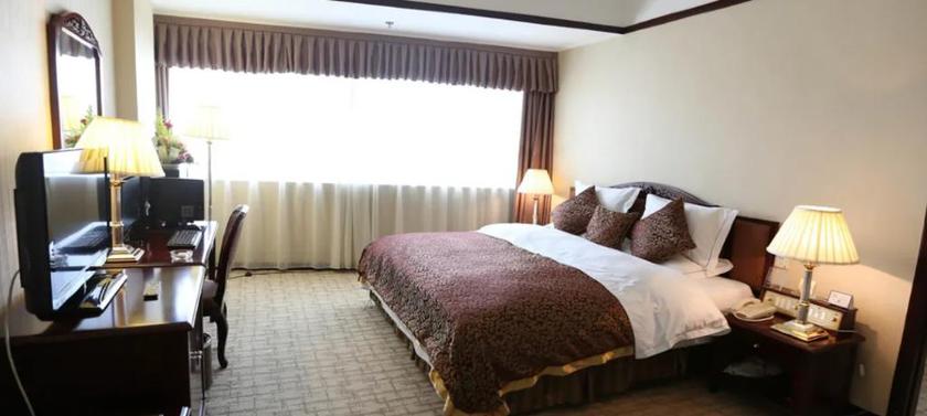 Imagen de la habitación del Hotel Telecom International. Foto 12