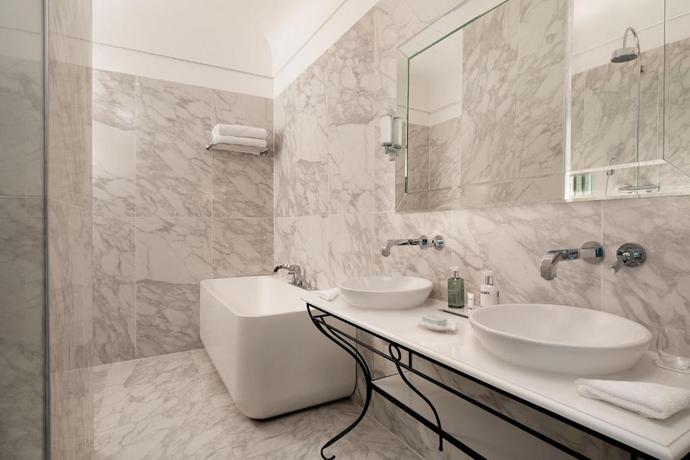 Imagen de la habitación del Hotel Telegraaf, Autograph Collection. Foto 10