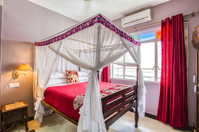 Imagen de la habitación del Hotel Tembo House. Foto 10