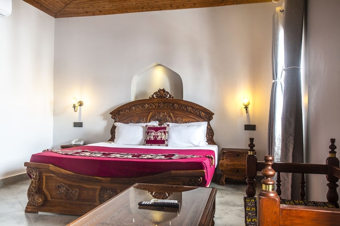 Imagen de la habitación del Hotel Tembo House. Foto 18
