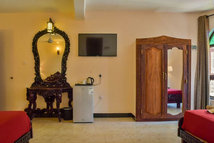 Imagen de la habitación del Hotel Tembo Palace. Foto 14