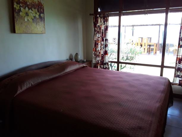 Imagen de la habitación del Hotel Temple Cafe and Seaside Cottages. Foto 8