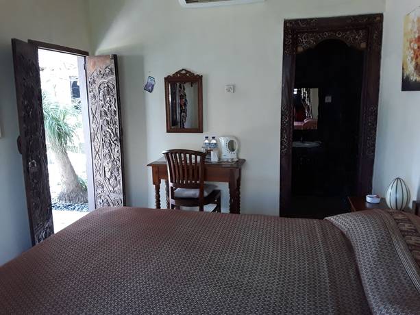 Imagen de la habitación del Hotel Temple Cafe and Seaside Cottages. Foto 17