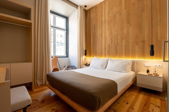 Imagen de la habitación del Hotel Tempo FLH. Foto 9