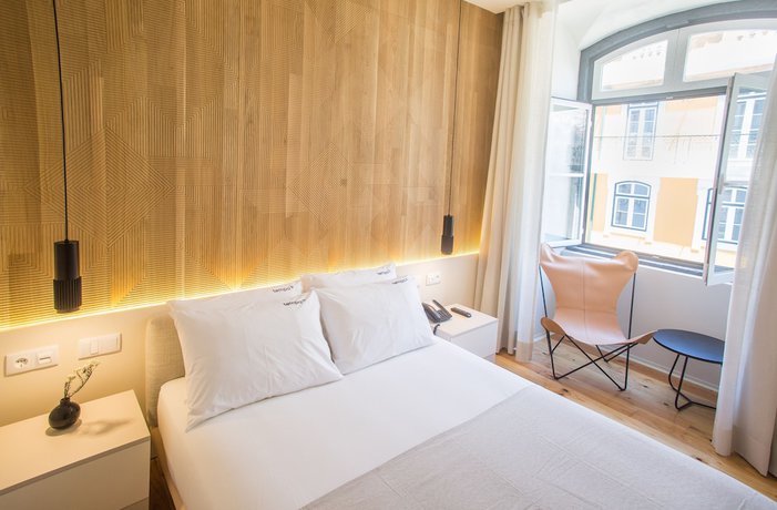 Imagen de la habitación del Hotel Tempo FLH. Foto 11