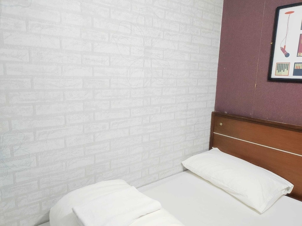 Imagen de la habitación del Hotel Tempo Inn At David Mansion. Foto 11