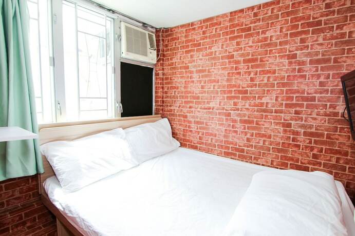 Imagen de la habitación del Hotel Tempo Inn - Cozy@national Court. Foto 17