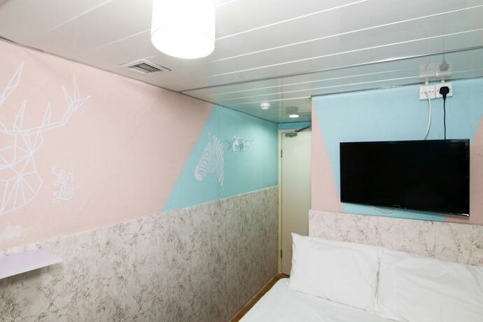Imagen de la habitación del Hotel Tempo Inn - Cozy@national Court. Foto 20