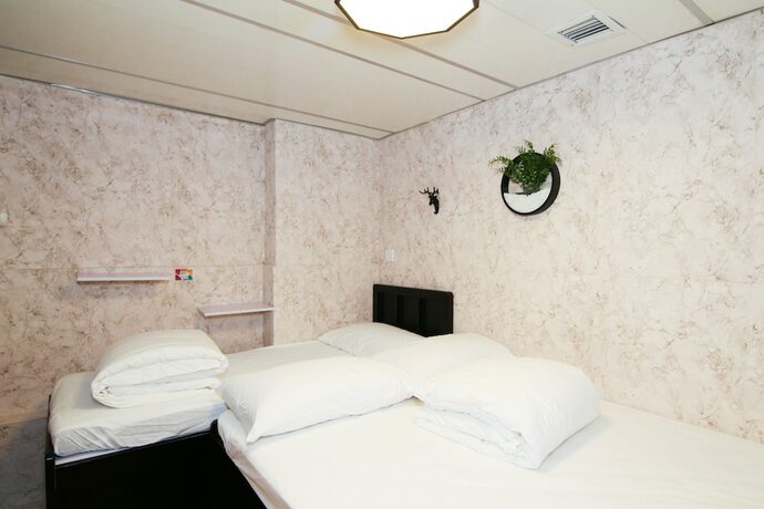 Imagen de la habitación del Hotel Tempo Inn - Cozy@national Court. Foto 21