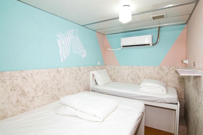 Imagen de la habitación del Hotel Tempo Inn - Cozy@national Court. Foto 24