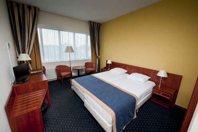 Imagen de la habitación del Hotel Ten Cate. Foto 14
