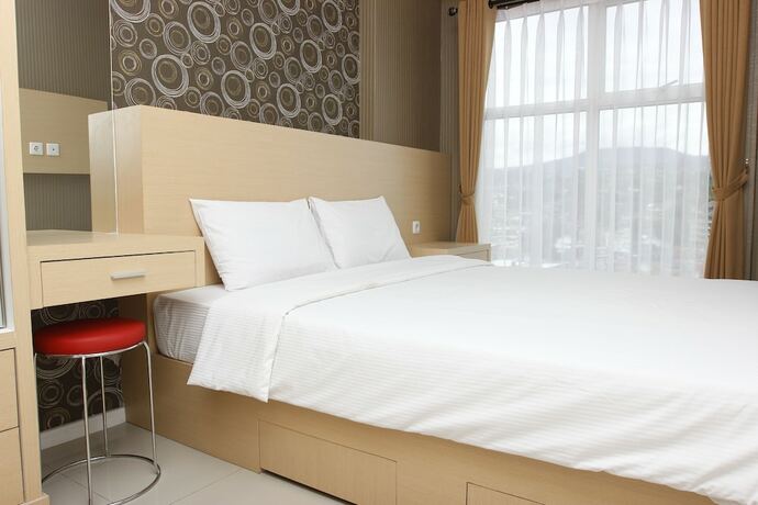 Imagen de la habitación del Hotel Ten Eleven Living Point. Foto 22