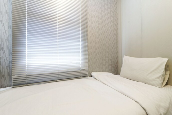 Imagen de la habitación del Hotel Ten Eleven Living Point. Foto 24