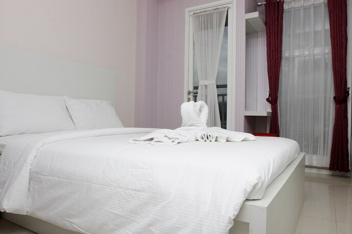 Imagen de la habitación del Hotel Ten Eleven Living Point. Foto 32