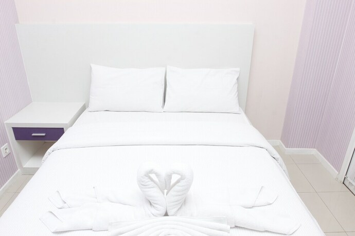 Imagen de la habitación del Hotel Ten Eleven Living Point. Foto 36