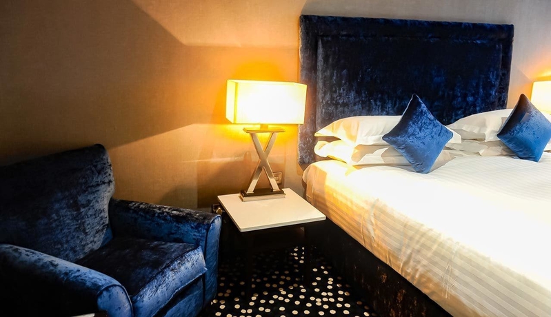 Imagen de la habitación del Hotel Ten Square. Foto 12