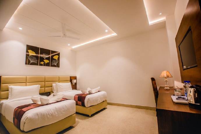 Imagen de la habitación del Hotel Ten Square. Foto 16